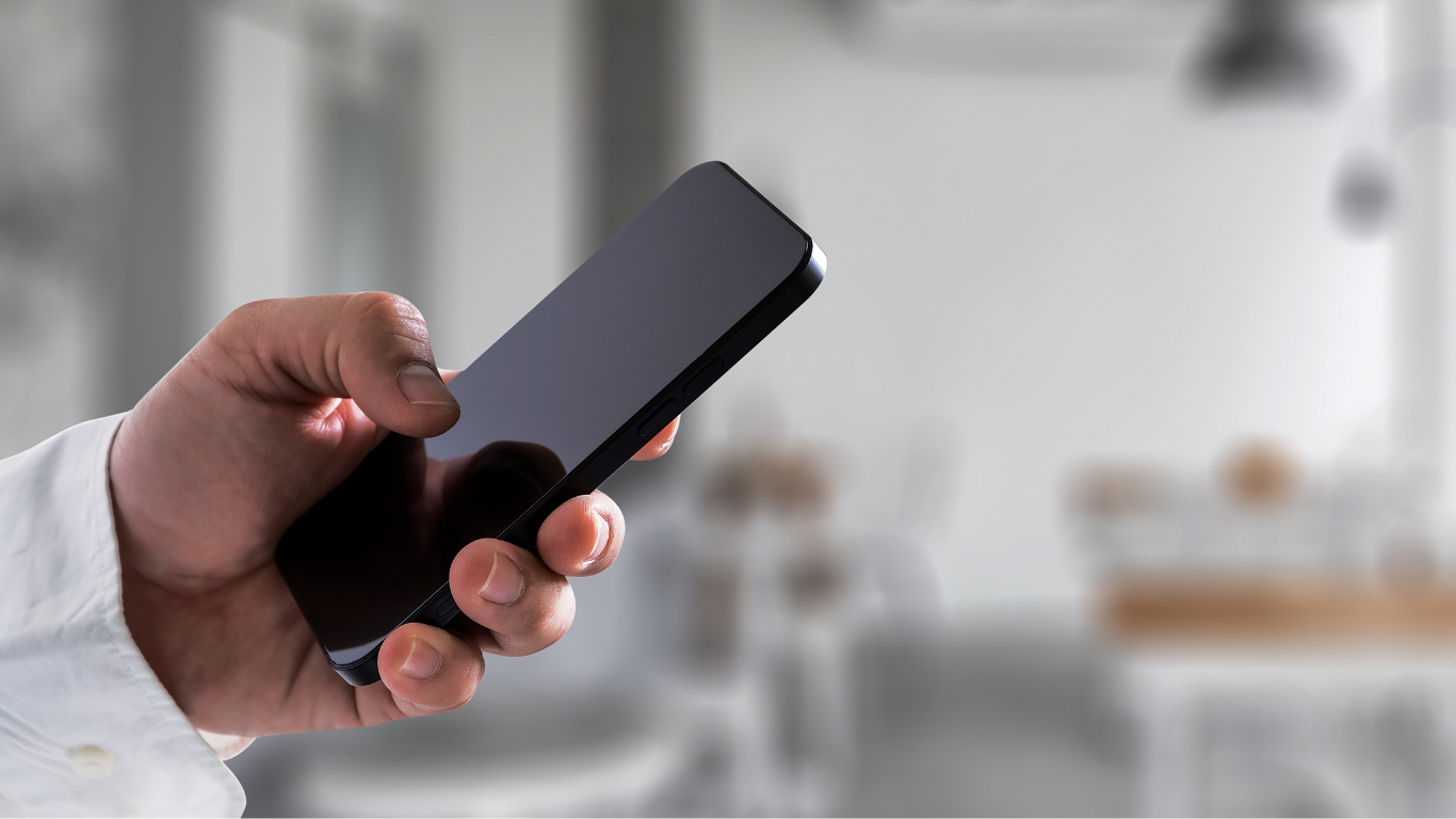 A man holding smartphone in his hands