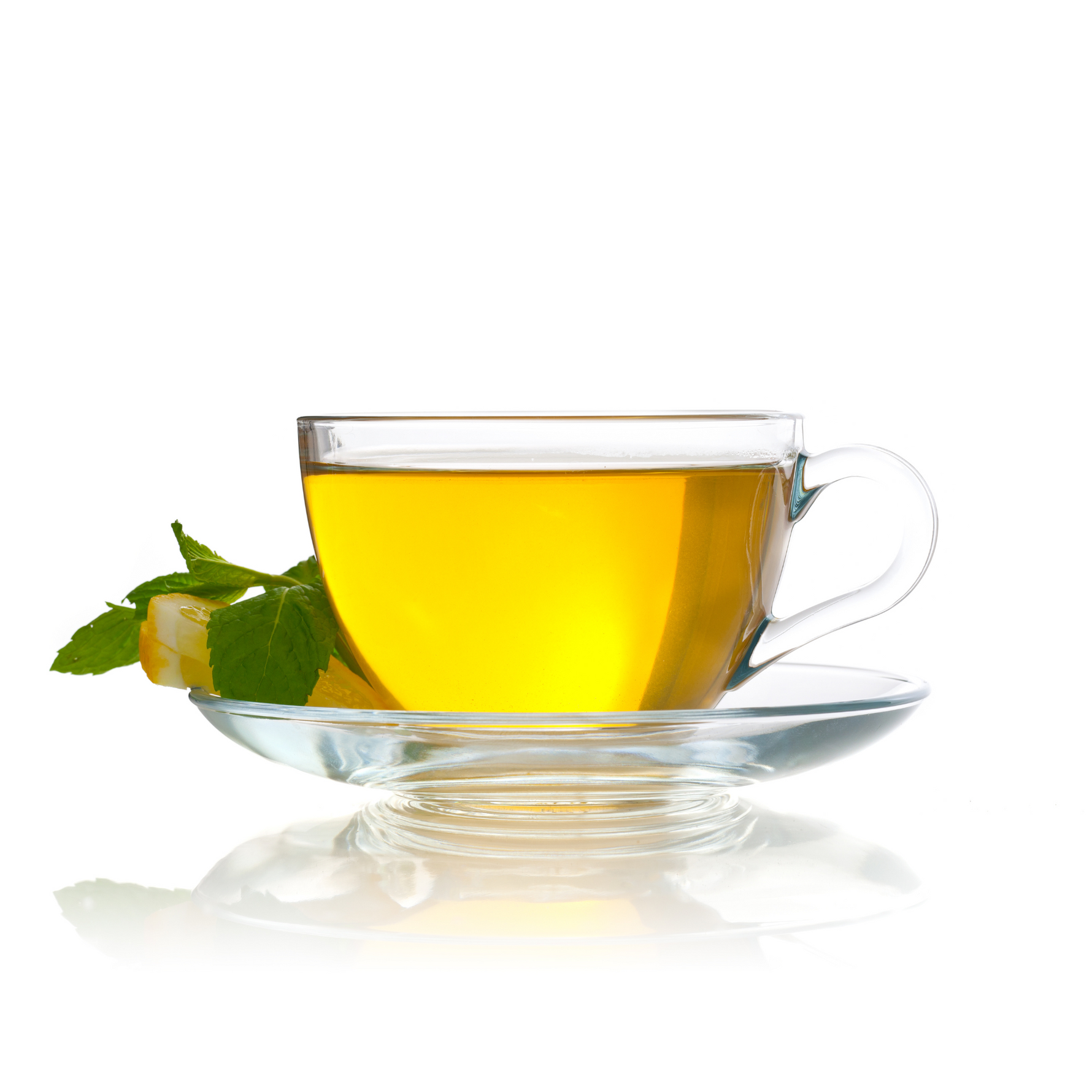 A fresh cup of green tea in glass cup with ginger and mint made freshly from green tea leaves